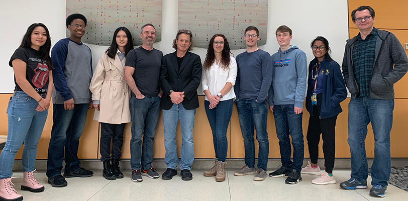 a group shot of Gary Hammer and members of his lab